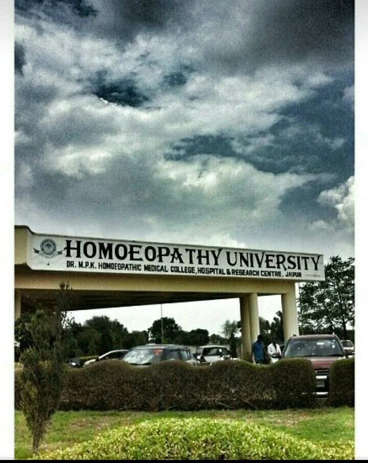 Homoeopathy University Jaipur Logo